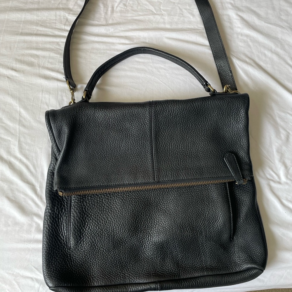 Black pebble leather coach messenger bag.